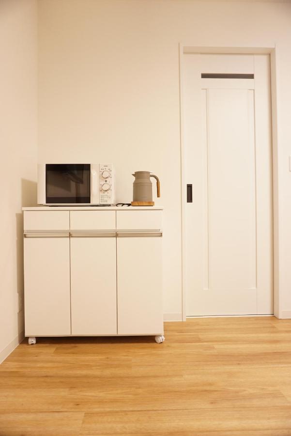Apartamento Sakura Shigure Shin-Osaka Exterior foto