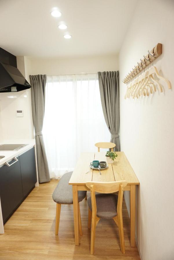 Apartamento Sakura Shigure Shin-Osaka Exterior foto