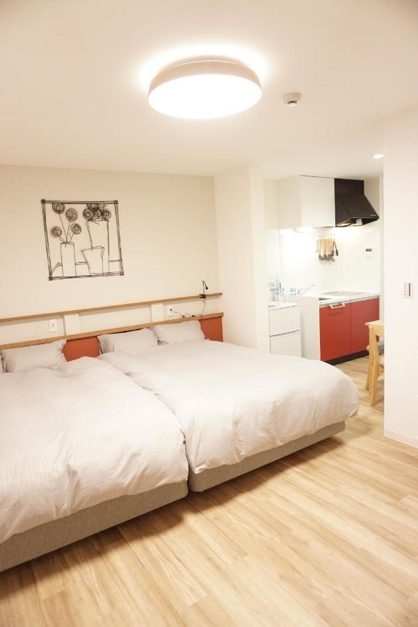Apartamento Sakura Shigure Shin-Osaka Exterior foto